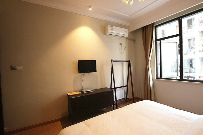 Imagen de la habitación del Hotel Suxi Weishe Guest House. Foto 4