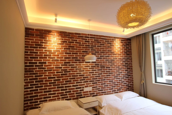 Imagen de la habitación del Hotel Suxi Weishe Guest House. Foto 7