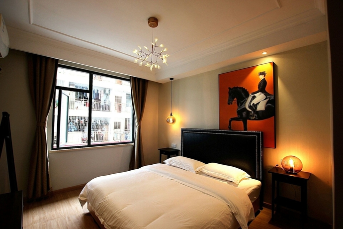 Imagen de la habitación del Hotel Suxi Weishe Guest House. Foto 8