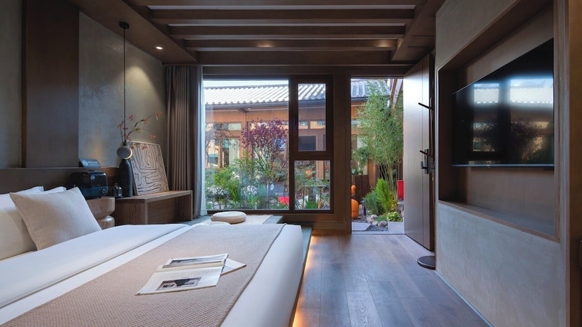 Imagen de la habitación del Hotel Suyintang Resort Courtyard. Foto 8