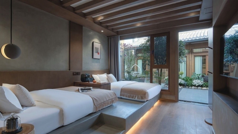 Imagen de la habitación del Hotel Suyintang Resort Courtyard. Foto 10