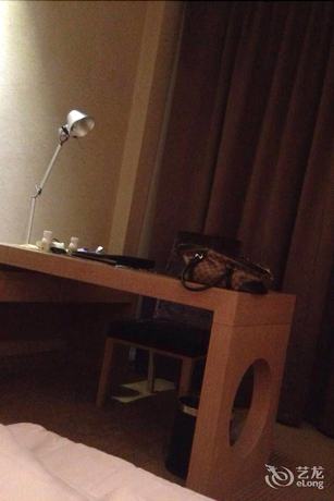 Imagen de la habitación del Hotel Suzhou Canal Garden Hotel. Foto 5