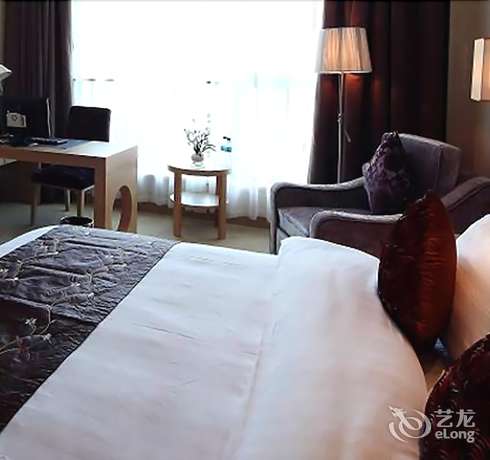 Imagen de la habitación del Hotel Suzhou Canal Garden Hotel. Foto 6