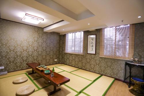 Imagen de la habitación del Hotel Suzhou Jade Snow Lodge. Foto 10