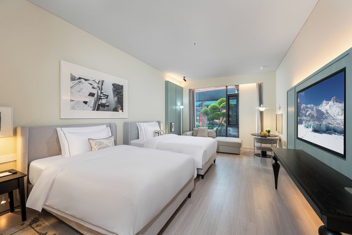 Imagen de la habitación del Hotel Suzhou Jinji Lake LAGORA Laigu. Foto 4