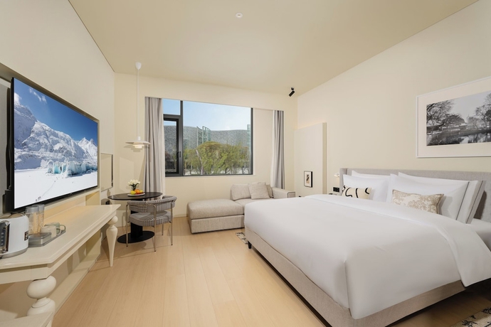 Imagen de la habitación del Hotel Suzhou Jinji Lake LAGORA Laigu. Foto 5