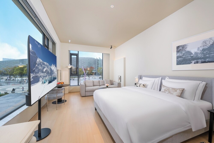 Imagen de la habitación del Hotel Suzhou Jinji Lake LAGORA Laigu. Foto 6