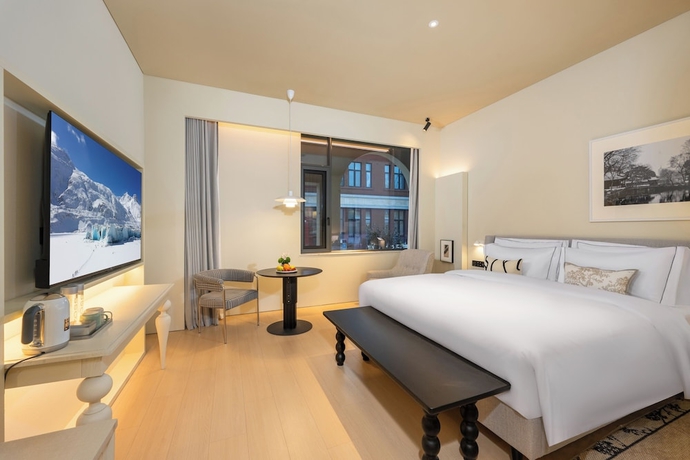 Imagen de la habitación del Hotel Suzhou Jinji Lake LAGORA Laigu. Foto 7