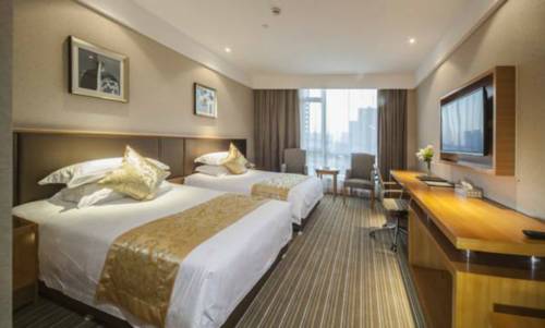 Imagen de la habitación del Hotel Suzhou Joy Holiday Renmin Road Branch. Foto 6