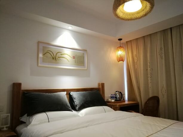 Imagen de la habitación del Hotel Suzhou Leisure Guest House. Foto 15