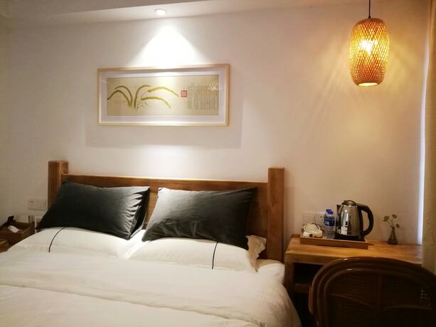 Imagen de la habitación del Hotel Suzhou Leisure Guest House. Foto 20