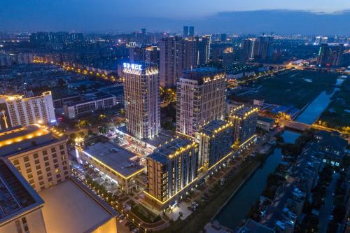 Imagen general del Hotel Suzhou Maoyuan Qiluo Pushi Apartment. Foto 3