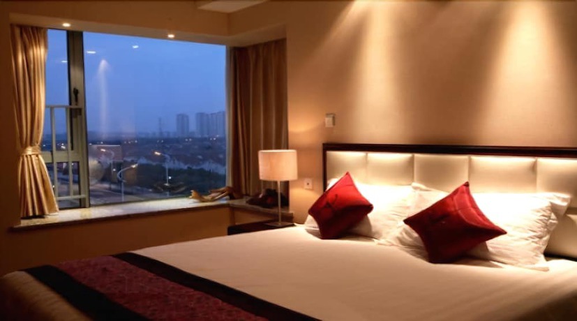 Imagen de la habitación del Hotel Suzhou Regalia Serviced Residences. Foto 14