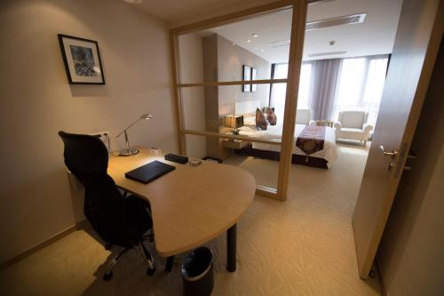 Imagen de la habitación del Hotel Suzhou Sun Plaza. Foto 6