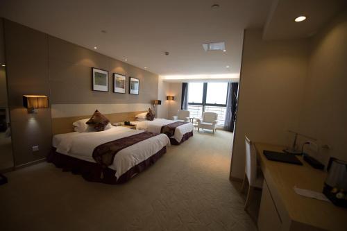 Imagen de la habitación del Hotel Suzhou Sun Plaza. Foto 7
