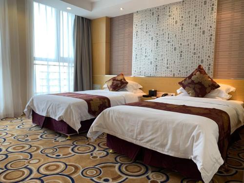 Imagen de la habitación del Hotel Suzhou Sun Plaza. Foto 8