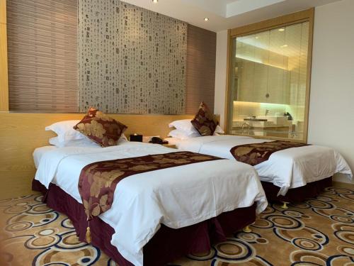 Imagen de la habitación del Hotel Suzhou Sun Plaza. Foto 9