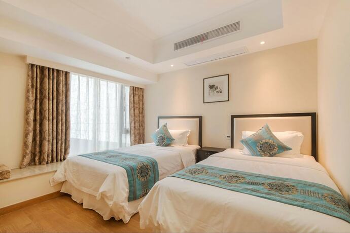 Imagen general del Hotel Suzhou Taihu Meilanju House. Foto 4