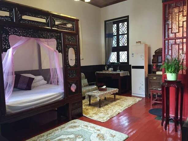 Imagen de la habitación del Hotel Suzhou Yard. Foto 12