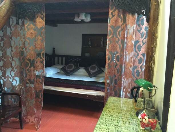 Imagen de la habitación del Hotel Suzhou Yard. Foto 14