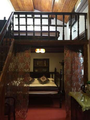 Imagen de la habitación del Hotel Suzhou Yard. Foto 15