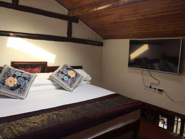 Imagen de la habitación del Hotel Suzhou Yard. Foto 22
