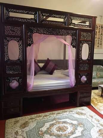 Imagen de la habitación del Hotel Suzhou Yard. Foto 23
