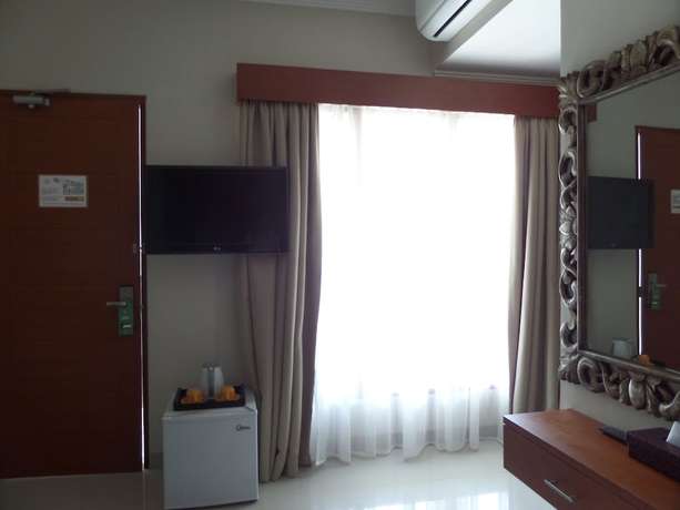 Imagen de la habitación del Hotel Svarna Sanur. Foto 10