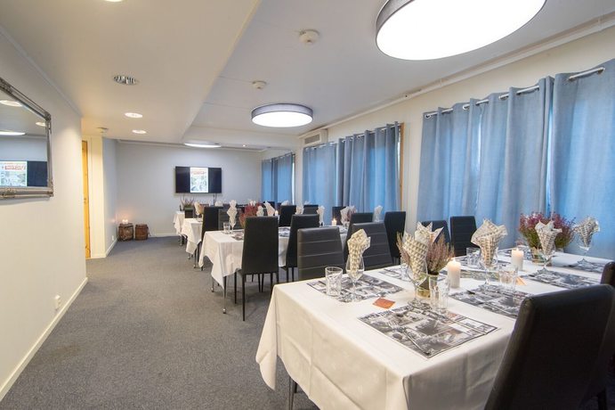 Imagen del bar/restaurante del Hotel Svartisen Apartments. Foto 2