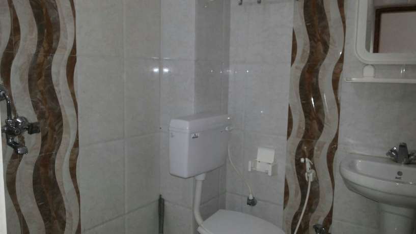 Imagen de la habitación del Hotel Swagat Guest House, Bodhgaya. Foto 6