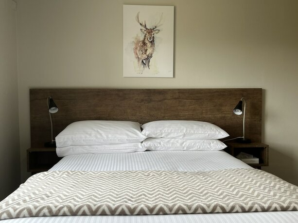 Imagen de la habitación del Hotel Swagman Chalet. Foto 18