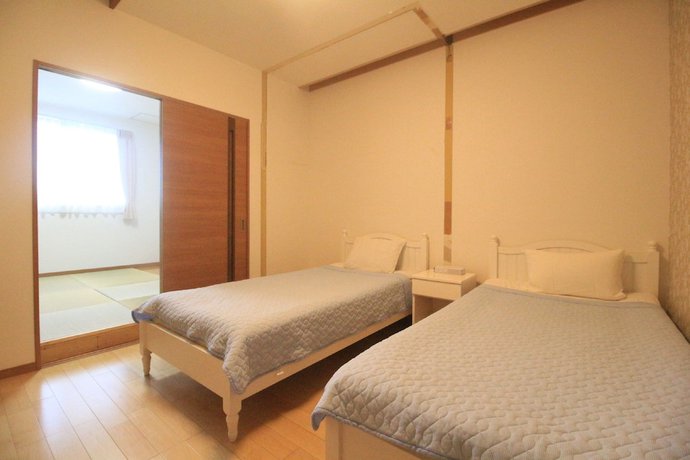 Imagen de la habitación del Hotel Swan Lake Nagara. Foto 9