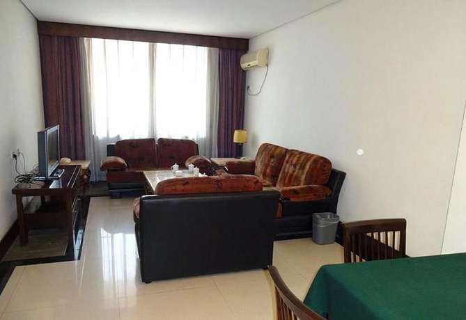 Imagen de la habitación del Hotel Swan Lake Spring Vacation Village - Tianjin. Foto 2