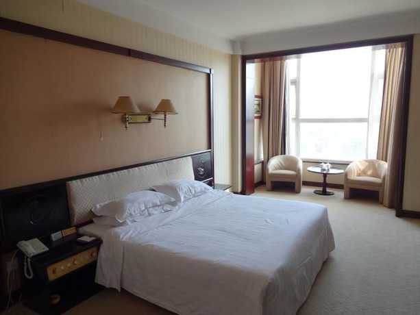 Imagen de la habitación del Hotel Swan Lake Spring Vacation Village - Tianjin. Foto 3