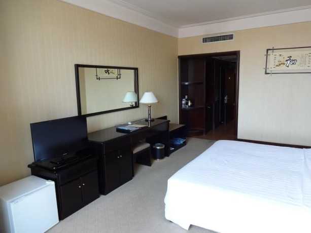 Imagen de la habitación del Hotel Swan Lake Spring Vacation Village - Tianjin. Foto 4