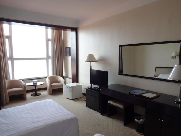 Imagen de la habitación del Hotel Swan Lake Spring Vacation Village - Tianjin. Foto 6