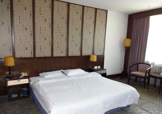 Imagen de la habitación del Hotel Swan Lake Spring Vacation Village - Tianjin. Foto 7