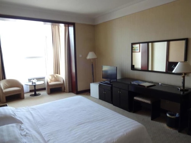 Imagen de la habitación del Hotel Swan Lake Spring Vacation Village - Tianjin. Foto 8