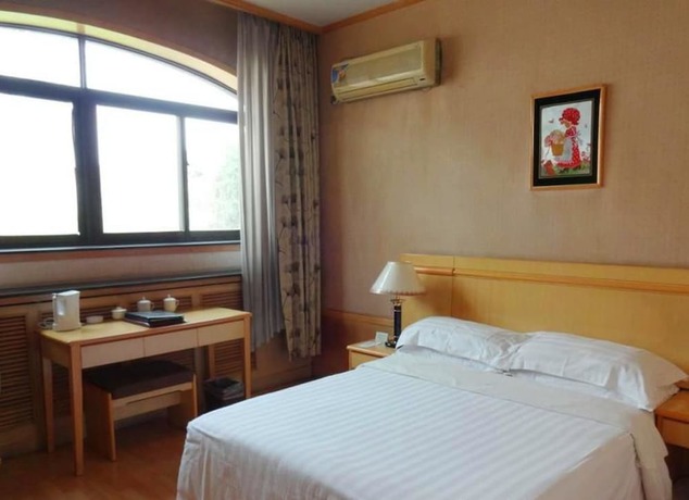 Imagen de la habitación del Hotel Swan Lake Spring Vacation Village - Tianjin. Foto 10