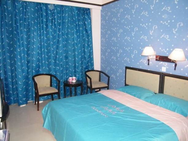 Imagen de la habitación del Hotel Swan Lake Spring Vacation Village - Tianjin. Foto 12