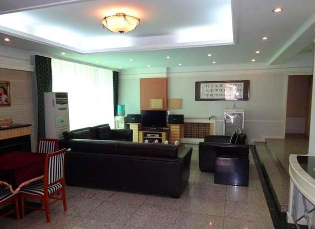 Imagen de la habitación del Hotel Swan Lake Spring Vacation Village - Tianjin. Foto 13