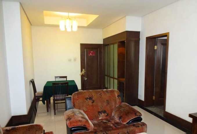 Imagen de la habitación del Hotel Swan Lake Spring Vacation Village - Tianjin. Foto 14