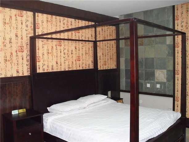 Imagen de la habitación del Hotel Swan Lake Spring Vacation Village - Tianjin. Foto 15