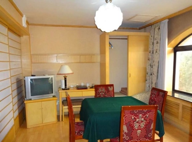 Imagen de la habitación del Hotel Swan Lake Spring Vacation Village - Tianjin. Foto 16