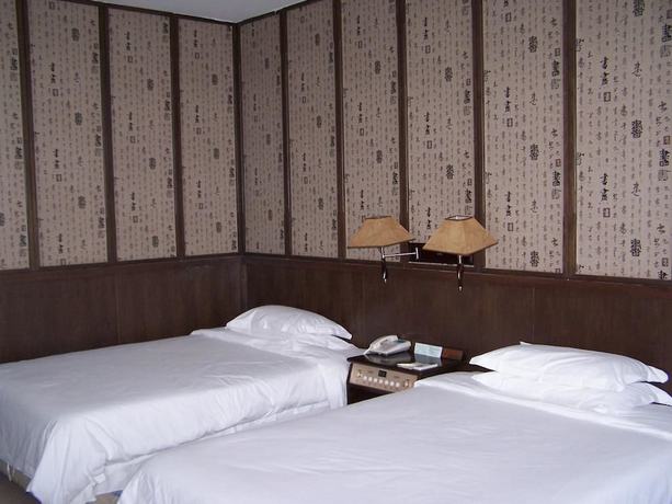 Imagen de la habitación del Hotel Swan Lake Spring Vacation Village - Tianjin. Foto 17