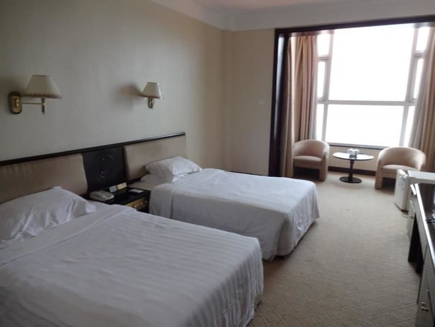 Imagen de la habitación del Hotel Swan Lake Spring Vacation Village - Tianjin. Foto 18