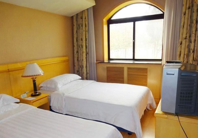 Imagen de la habitación del Hotel Swan Lake Spring Vacation Village - Tianjin. Foto 19