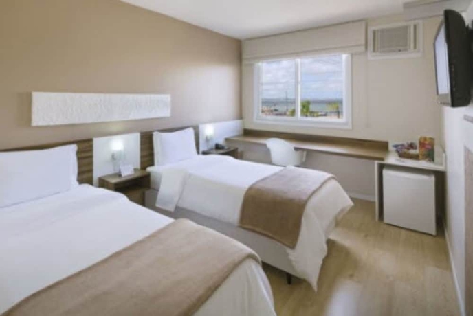 Imagen de la habitación del Hotel Swan Rio Grande. Foto 8