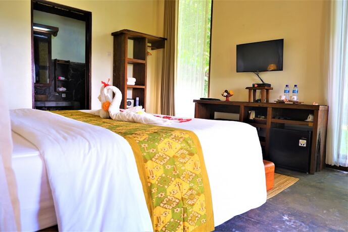Imagen de la habitación del Hotel Swar Bali Lodge. Foto 27
