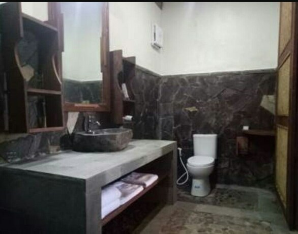 Imagen de la habitación del Hotel Swar Bali Lodge. Foto 33